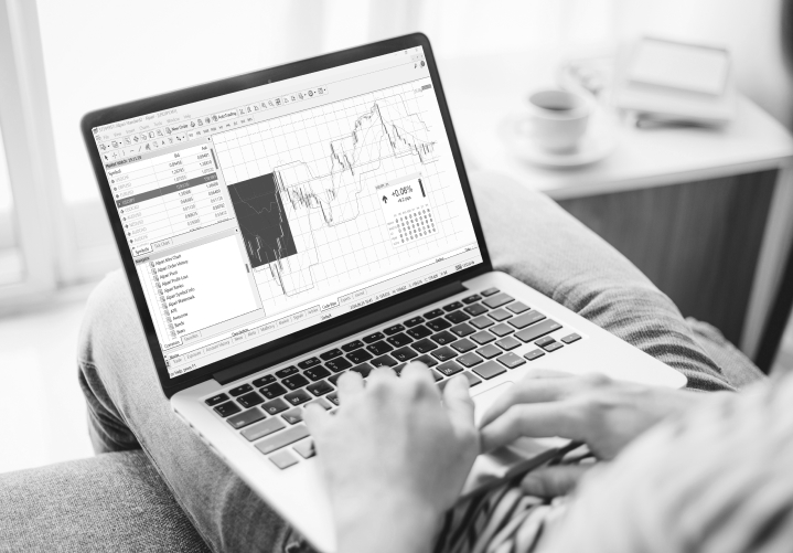 A person using a trading app on their tablet